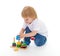 Little boy in the classroom at Montessori environment.