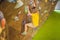 Little boy climbing a rock wall in special boots. indoor