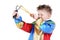 Little boy in clown costume holds slingshot and aims