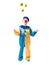 Little boy in clown suit juggling three balls and smiling