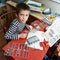 Little boy collects plastic model tank