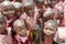 Little boy crowded between students, Uganda