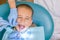 A little boy at a dentist& x27;s reception in a dental clinic. Children& x27;s dentistry, Pediatric Dentistry. A female