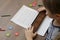 Little boy doing simple Mathematics exercises with abacus scores. Mental arithmeric. View from shoulder