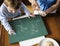 Little boy drawing dinosaurs with chalk