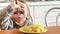 Little Boy Eating Potatoes