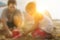 Little boy and father building sand castle at beach