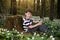 Little boy in forest on flowers field