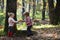 Little boy and girl friends camping in woods. Childhood and child friendship, love and trust. Brother and sister have