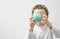 Little boy with globe in his hand with white background stock photo