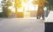 Little boy goes in for sports on a bicycle, and learns to ride in a skate park leaving the slope in the sun at sunset of the day