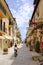 A little boy going with bicycle in the picturesque Italian village. San Felice Circeo, Lazio, Italy