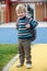 Little Boy Going To School Wearing Backpack