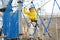 Little boy having fun in Adventure Park for children amoung ropes, stairs, bridges. Outdoor climbing adventure playground in