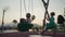 Little boy having fun on chain swing. The simple joys of childhood.