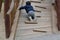 Little boy having fun on a playground