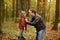 Little boy with his father during stroll in the forest