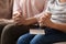 Little boy and his mother praying at home, closeup