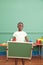 Little boy holding a balckboard