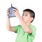 Little boy holding a radio remote control (controlling handset) for helicopter , drone or plane Isolated