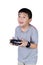 Little boy holding a radio remote control for helicopter, drone