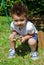 Little boy holding turtle