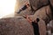 Little boy leaping into his father`s arms at the beach