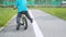 Little boy learns to ride a bike