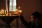 Little Boy lighting a church candle