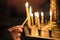 Little Boy lighting a church candle