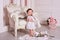 Little boy like angel smile. international children`s day. Toddler boy in angel wings in baroque style interior room