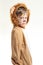 Little boy in lion coat looking to the side