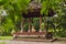 Little boy meditate practicing yoga in the traditional balinesse gazebo