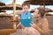 Little boy with is mother at a beach resort