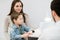 Little boy with mum on control pediatric visit at doctor\'s office