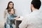 Little boy with mum on control pediatric visit at doctor\'s office