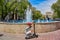 A little boy near fountains on Vazgen Sargsyan street, in the 2750th anniversary Park of Yerevan, near Vernissage market