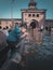 A little boy performing ablution for Salah in Jamia Masjid Srinagar Kashmir