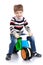 Little boy on a plastic bike