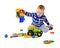Little boy playing actively with plastic toys
