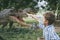 Little boy playing in the adventure dino park