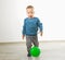 Little boy playing with a ball. Soft focus