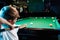 Little boy playing billiards, recreation, entertainment, children`s sports