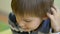 Little boy playing checkers in close-up