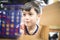 Little boy playing connect four game soft focus at eye contact