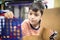 Little boy playing connect four game soft focus at eye contact