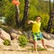 Little boy playing with frisbee disc.