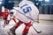 Little boy playing ice hockey