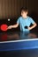 Little boy playing ping pong