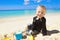 little boy playing sand beach pictures